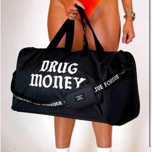 NIB unused unopened BLACK CANVAS DUFFEL BAG